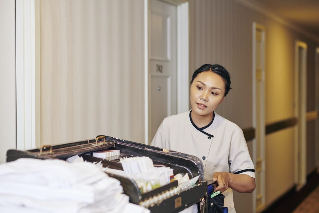 Maid with cart in the hotel